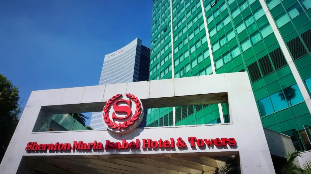 Exterior view of the Sheraton Mexico City Maria Isabel Hotel, showcasing its impressive architecture and prime location in Mexico City's bustling financial district.