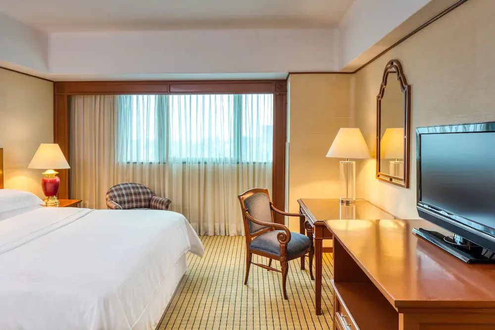 Interior view of a room in Sheraton Mexico City Maria Isabel Hotel, showcasing luxurious accommodations with elegant decor and modern amenities