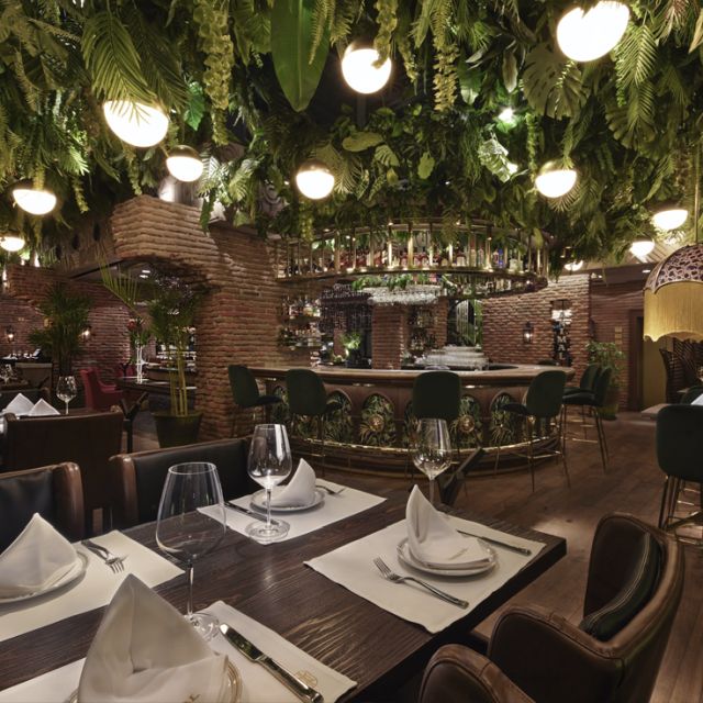 Interior of Animal Restaurant showcasing rustic decor and vibrant ambiance