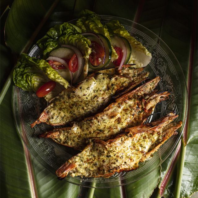 Grilled shrimp skewers with a side of fresh vegetables